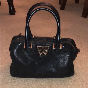 Kelly Wynn Duffle Dare You